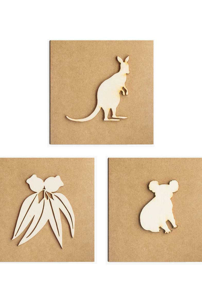 Collection of three cards decorated with wooden silouhettes of Australian fauna.