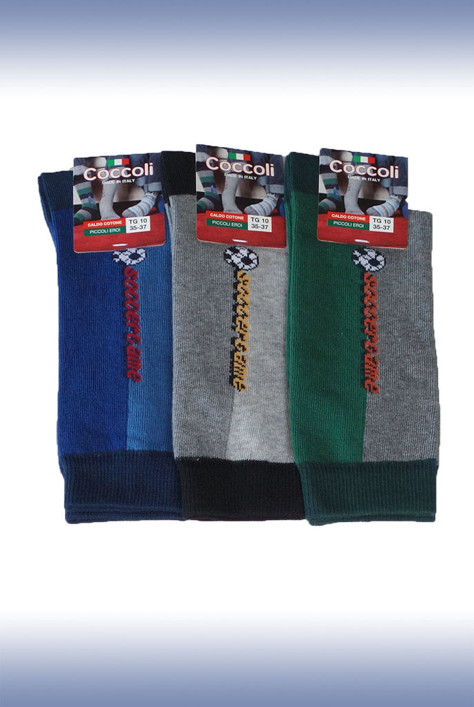 Three pairs of Coccoli boys trouser socks in different colours.