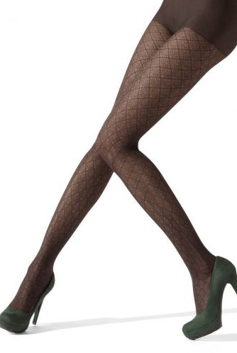 Ladies legs in dark brown pattern tights and green heels.
