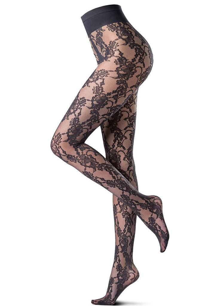 Side view of woman's legs wearing floral lace tights.