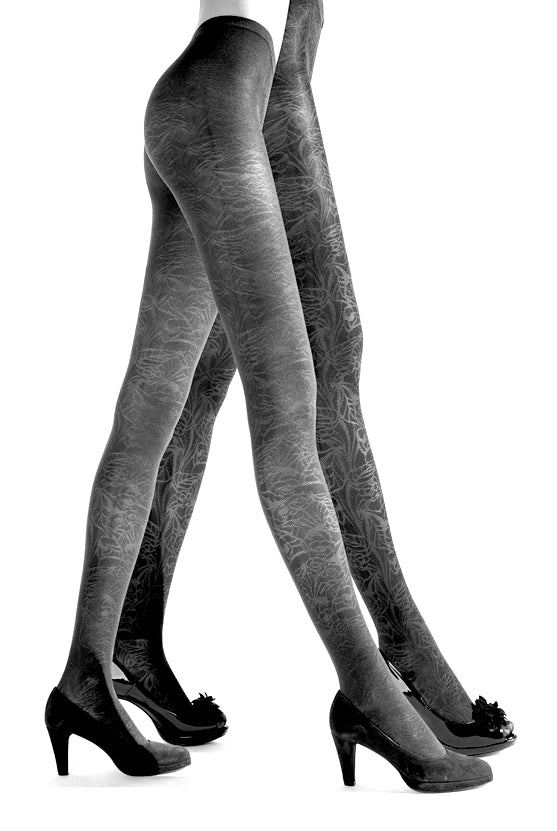 Two pairs of ladies legs walking and wearing  dark grey patterned tights.