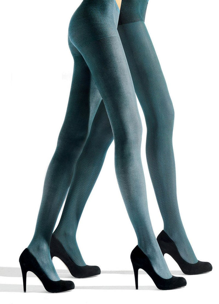 Side view of lady's legs striding in green tights and black heels.