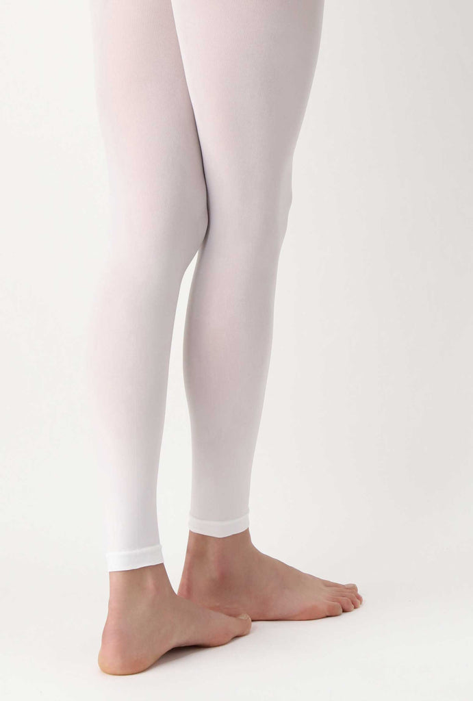 back view of lady's legs wearing white leggings.