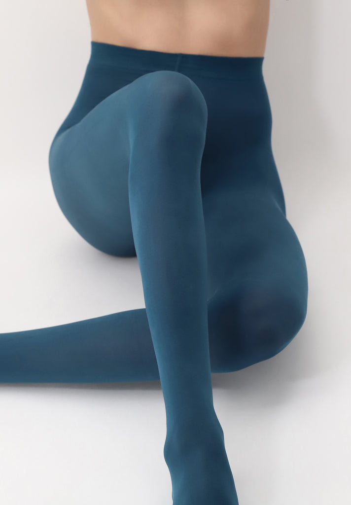 Front view of lady's legs in sitting position wearing cobalt blue tights.