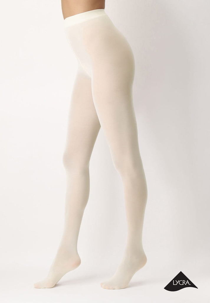 Side view of lady's legs wearing cream coloured tights.