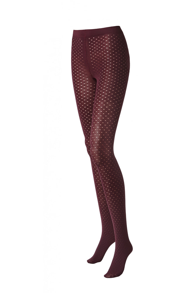 Lady mannequin legs wearing red dot tights.