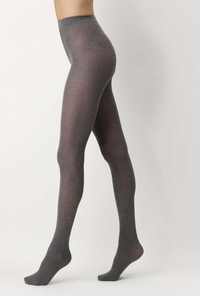 Side view of lady's legs, in a walking stance wearing grey melange tights.