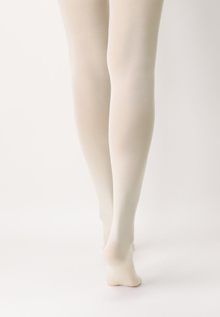 Back view of lady's lower legs wearing cream coloured tights.