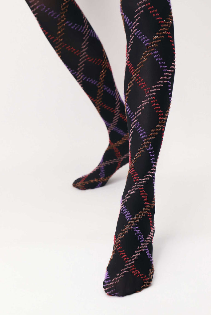 Front view of lady's lower legs, wearing diamond pattern red, gold and purple tights.