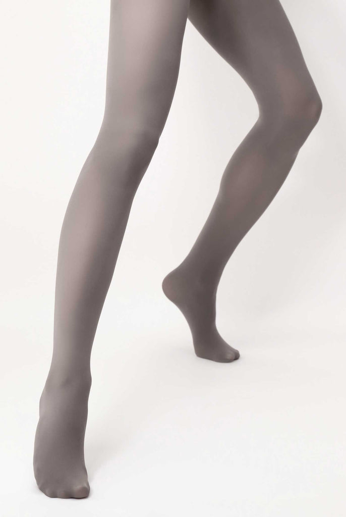 Lady's lower legs, standing feet apart in metal grey tights.