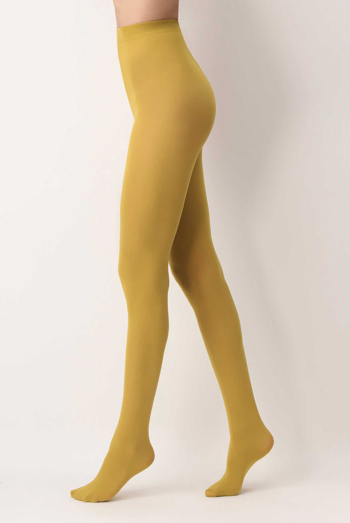 Side view of lady's legs in mustard yellow tights.