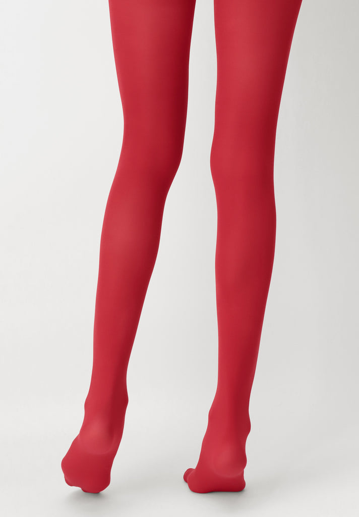 Back view of lady's legs wearing red tights.