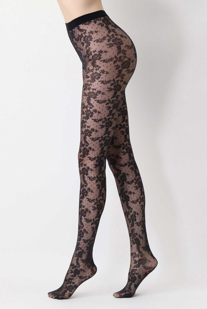 Side view of lady's legs, in black, lace floral tights.