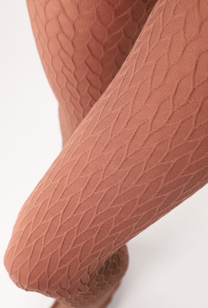 Close up of caramel patterned winter tights.