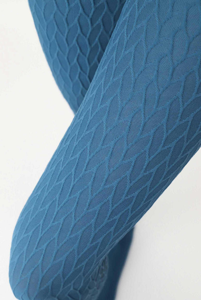 Close up of cobalt blue patterned tights.