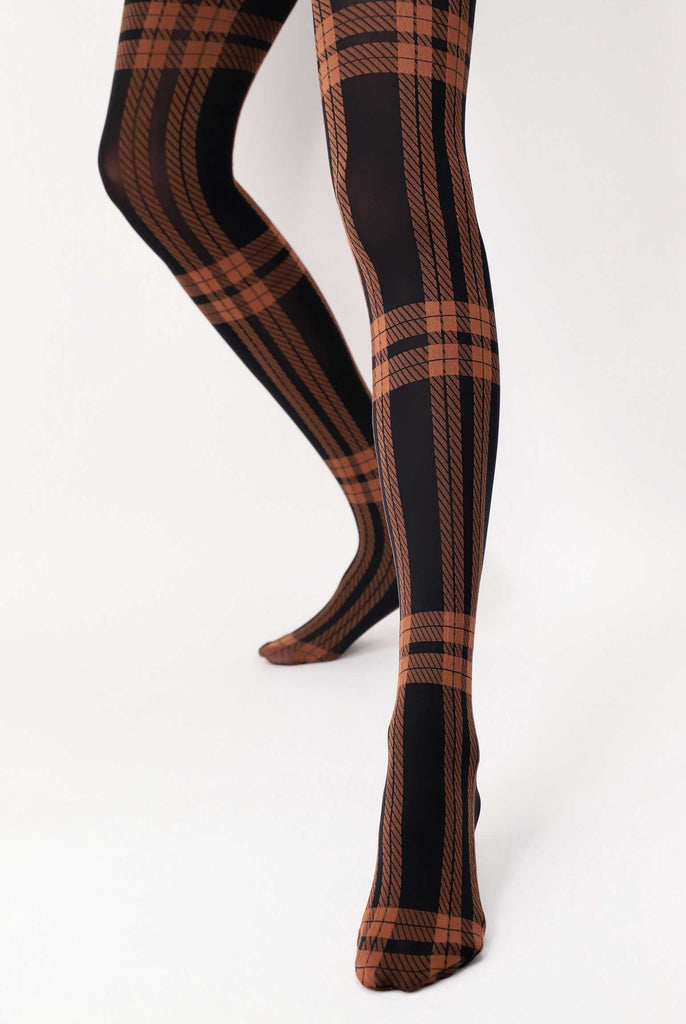 Front view of lady's legs  wearing sienna coloured check tights.