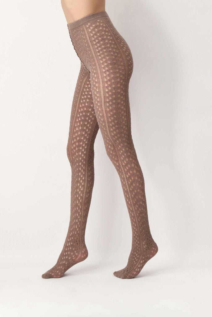 Side view of lady's legs wearing toffee coloured knit tights.
