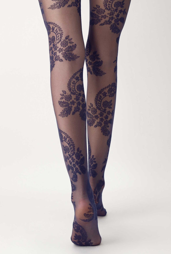 Back view of lady's legs in sheer blue paisley patterned tights.