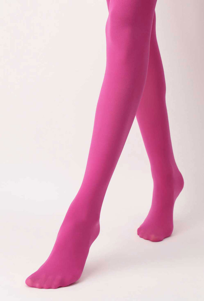 Side view of lady's bottom legs in glossy pink tights.