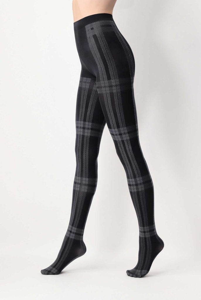 Side view of lady's legs in walking stance, wearing grey plaid tights.