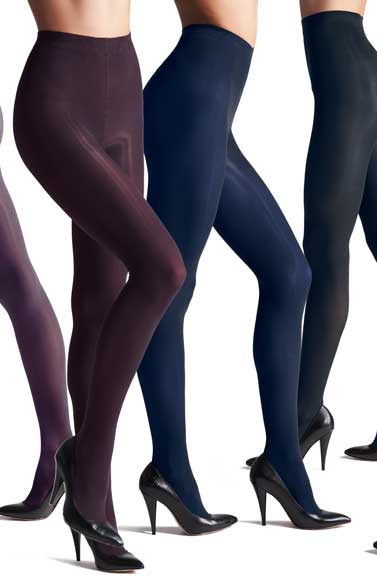 Ladies legs, standing, modelling coloured tights and wearing black heels.