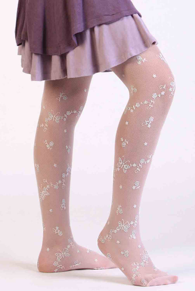 Side view of girl's legs wearing white flower and butterfly micro net tights.