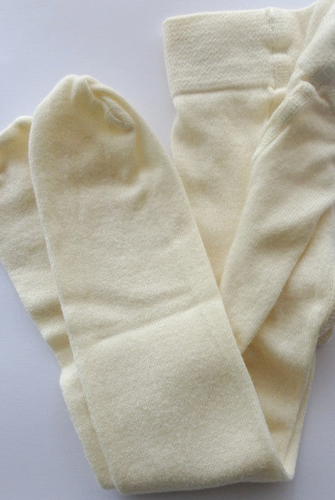 Folded baby cream cotton tights available in Australia.