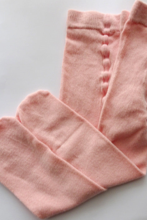 Folded baby rose pink cotton tights available in Australia.