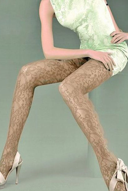 Ladies legs in sitting position wearing latte coloured lace tights.