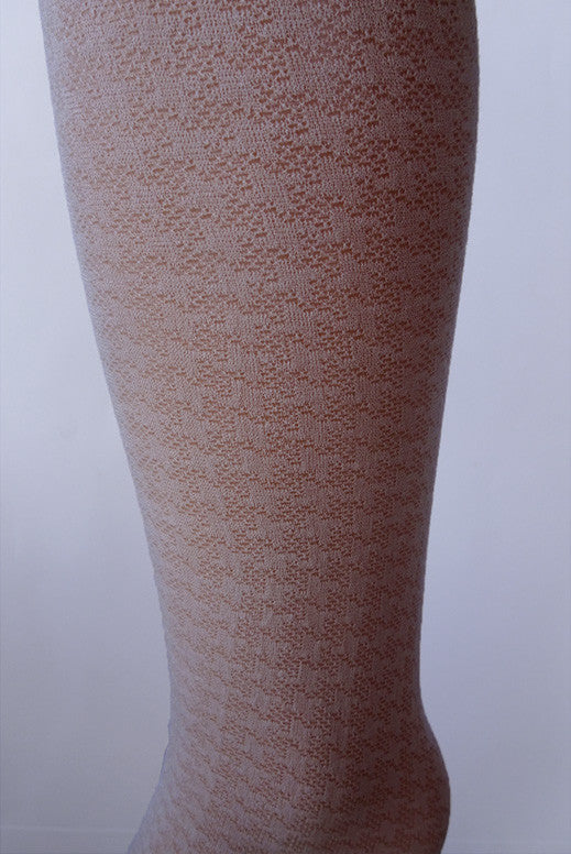 Close up of the pattern for the Educata tights by Franzoni, they have a houndstooth pattern.