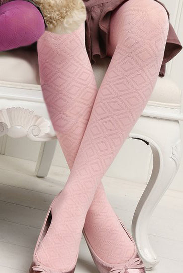 Close up of a girls' legs wearing rose pink Franzoni Calla diamond pattern tights .