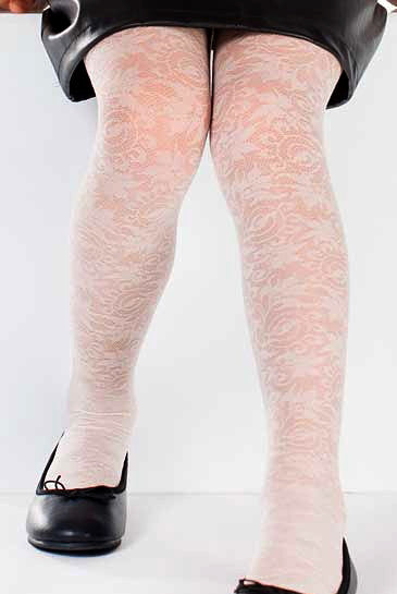 Close up of a girl's legs wearing white floral pattern tights.