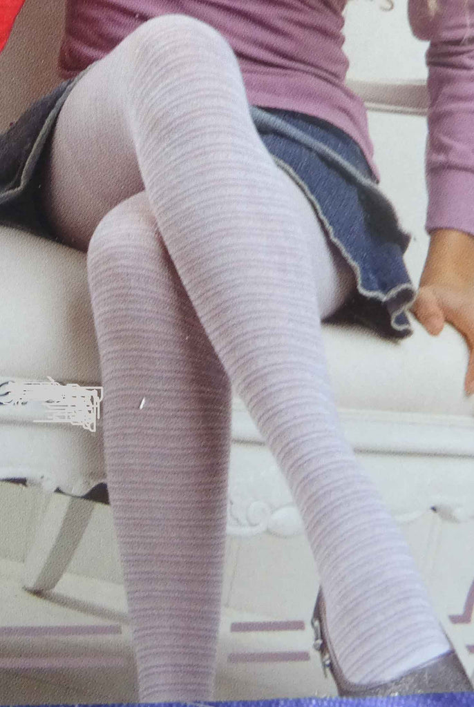 Close up of a girl's legs wearing lilac and white striped tights.