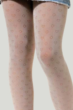 Close up of girl's legs in white sheer diamond and hear pattern tights.