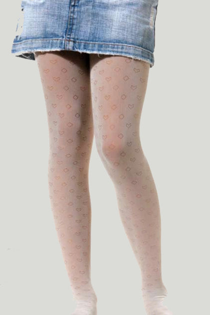 Front view of girl's legs gingerly standing wearing white semi sheer diamond, heart pattern tights and denim skirt.