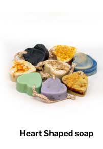 Display of heart shaped coloured soaps.