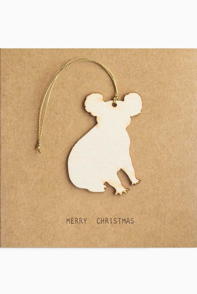 Kraft Christmas greeting card with koala hanging decoration.