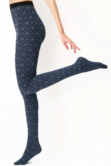 Side view of lady's outstretched leg, kicked back, wearing floral patterned tights.