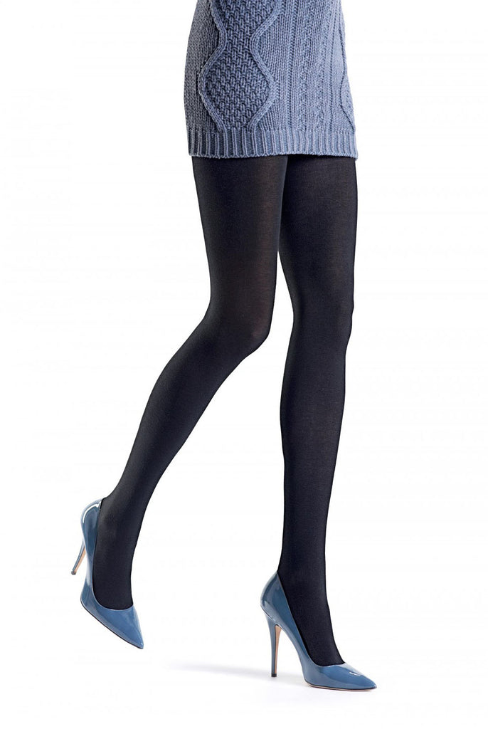 Close up of lady's front legs in black tights and blue heels.