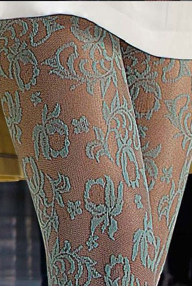 Close up of lady's thighs wearing Catherine lace floral tights by Oroblu hosiery.