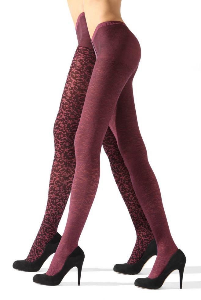 Side view of ladies legs walking in crimson and black pattern tights.