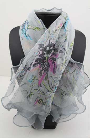 Grey flower print scarf wrapped around model bust.