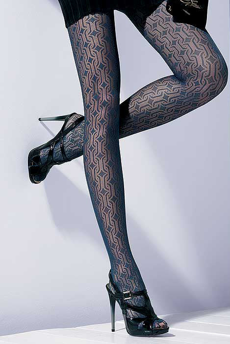 Close up of lady's legs wearing Oroblu Peggy marine blue Peggy sheer geometric tights.