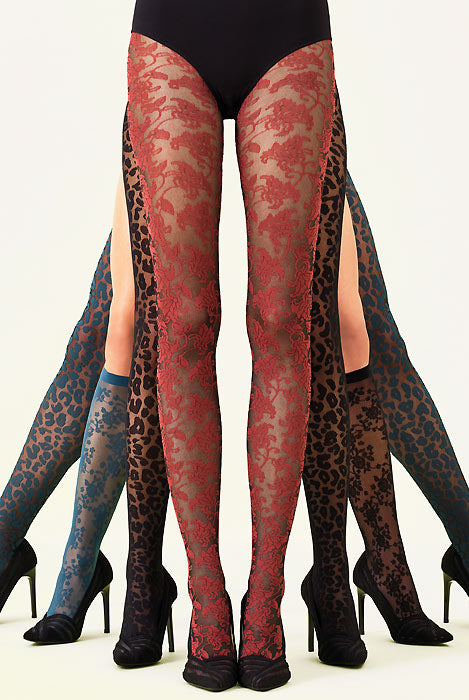 Front view of ladies legs in coloured lace flower tights.