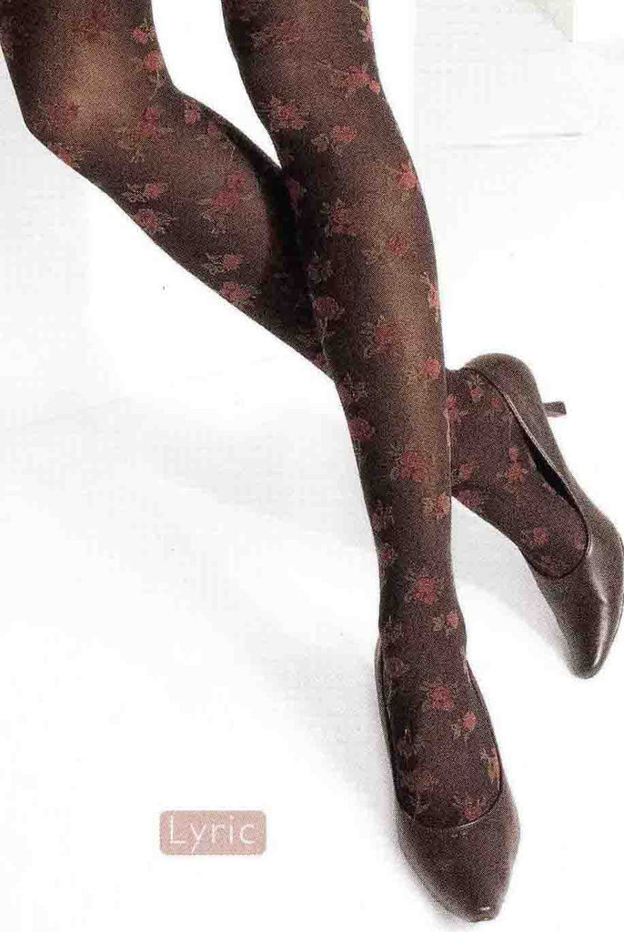 Close up of lower half of lady's legs crossed behind the knee wearing dark brown pink floral tights and brown high heel shoes.