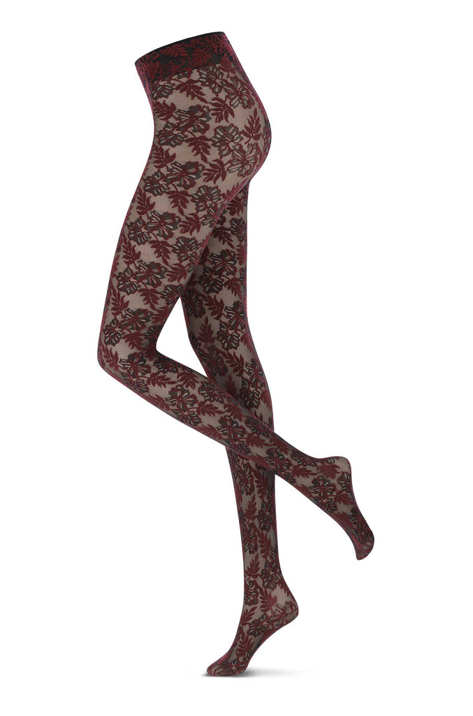 Side view of lady's legs in black and Bordeaux floral pattern.