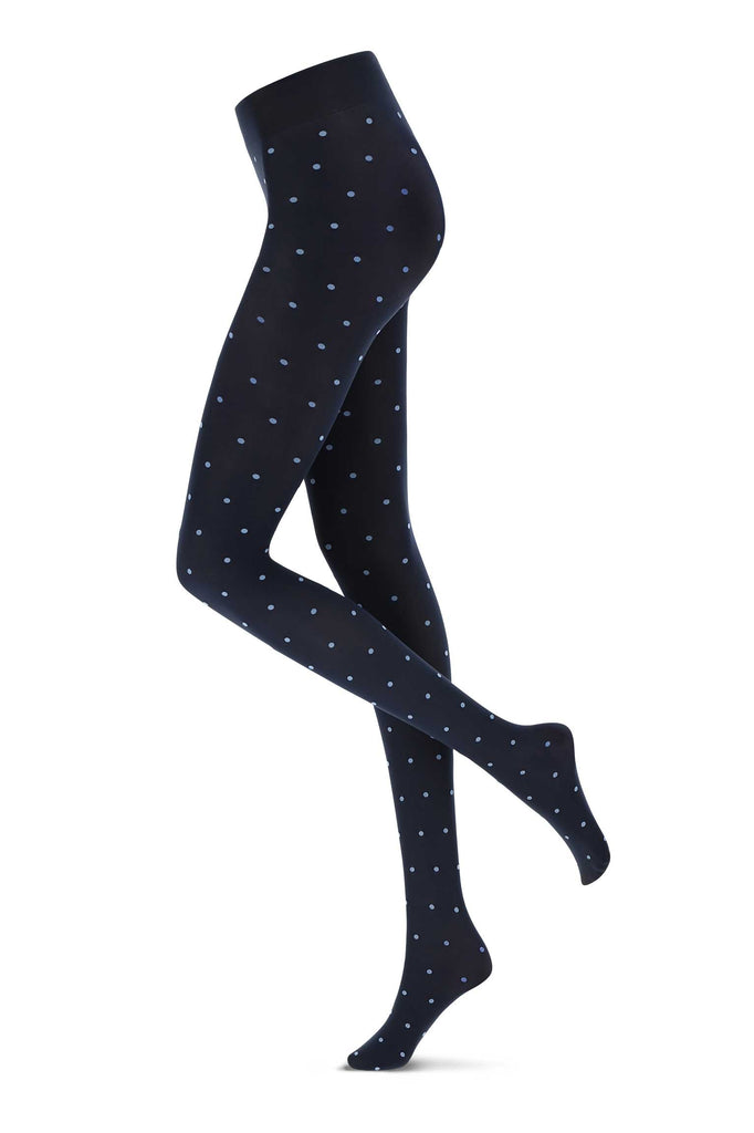 Lady's legs in black and light blue dotty tights.
