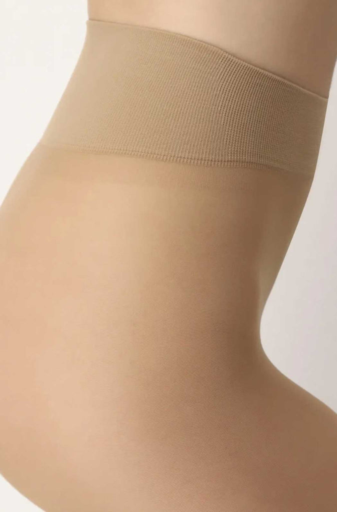 Close up of pantyhose nude sheer waistband.