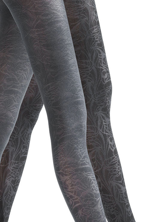 Close up of lady's legs in grey and black pattern tights.