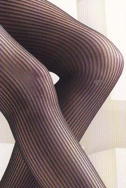 Close up of lady's  upper legs in vertical striped  pantyhose.